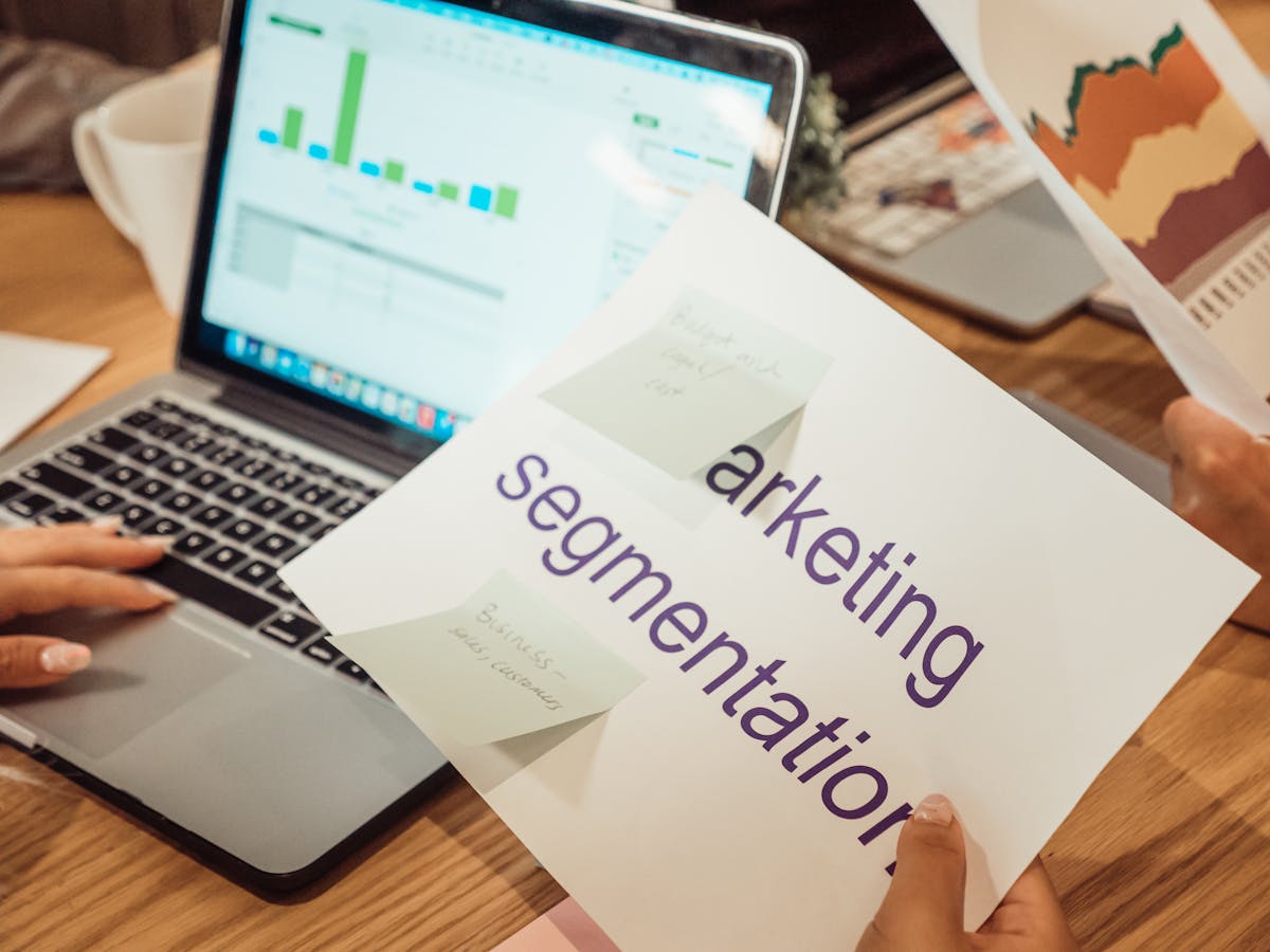Digital marketing professional analyzing content strategy and page performance data on a laptop